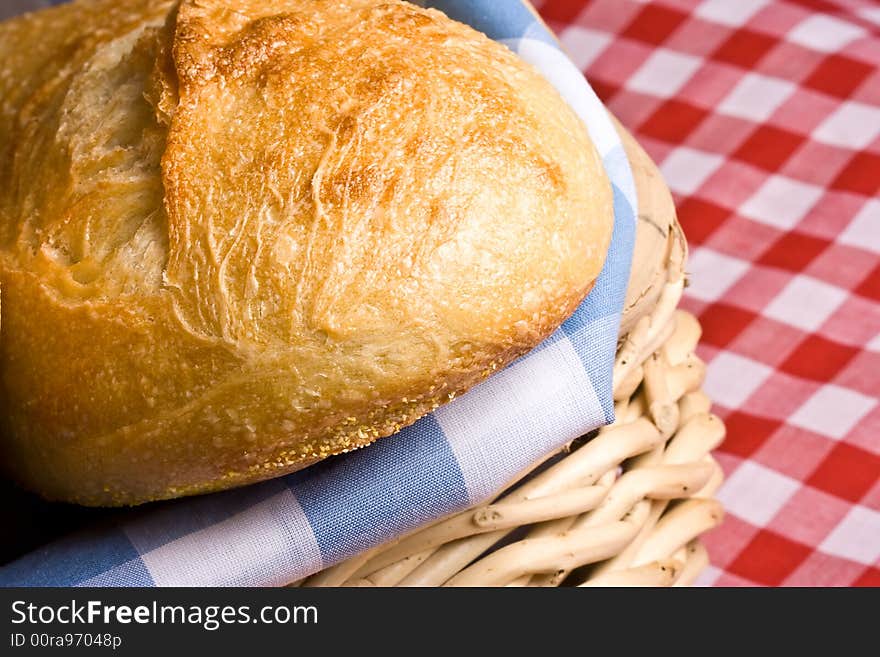 Freshly baked golden bread ready for some butter. Freshly baked golden bread ready for some butter