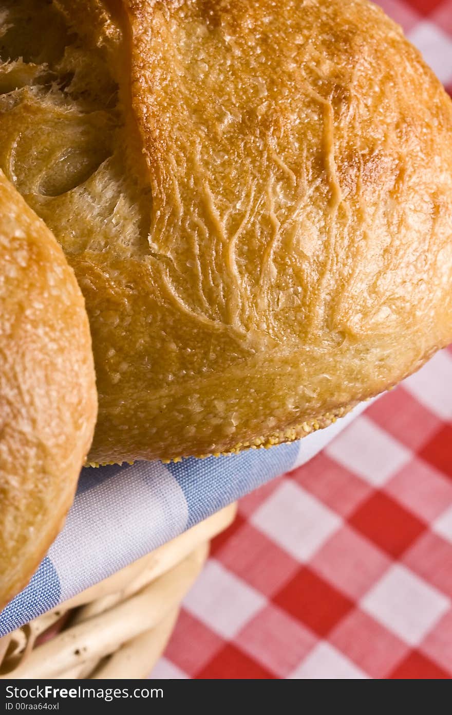 Freshly baked golden bread ready for some butter. Freshly baked golden bread ready for some butter