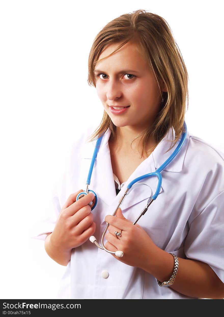 Female doctor holding a stethoscope and smiling. Female doctor holding a stethoscope and smiling