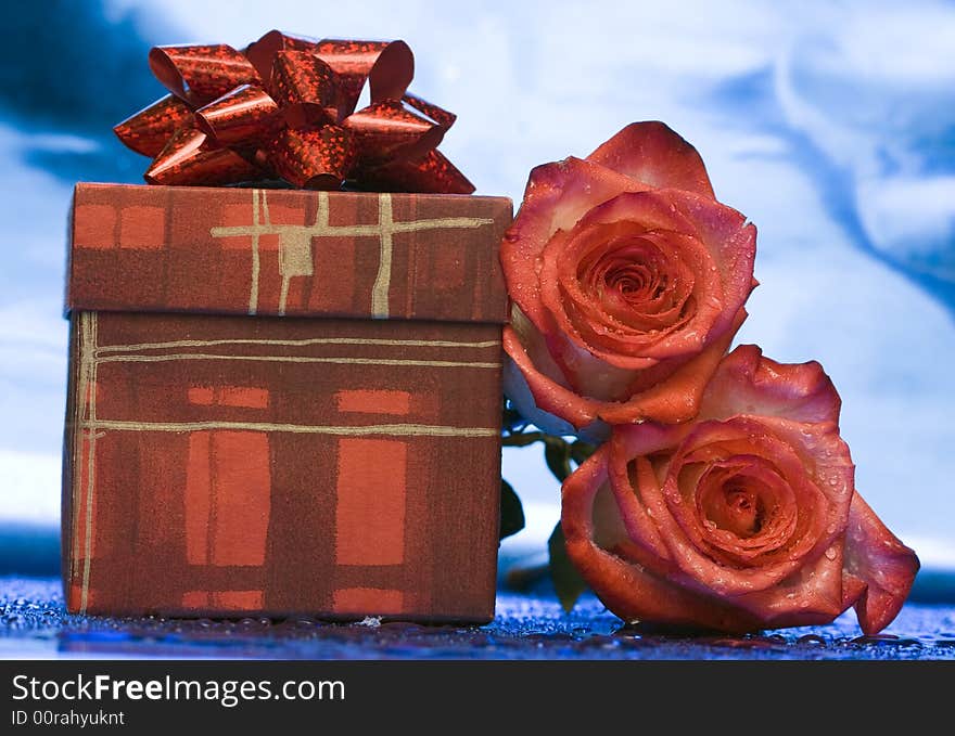 Gift box and red roses