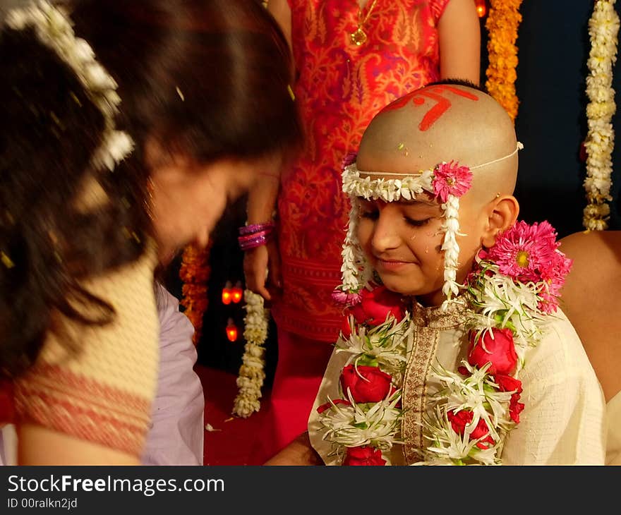 A happy expression of an Indian boy appearing for thread ceremony. A happy expression of an Indian boy appearing for thread ceremony.