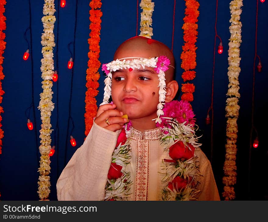 A boy appearing for thread ceremony. A boy appearing for thread ceremony.