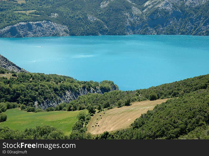 Serre-Poncon Lake, beneath the mountains of the Hautes-Alpes and the northern edge of the Alpes de Haute Provence, is the biggest artificial lake in Europe. One of its main caracteristic is its amazing blue color inherited from the water of Durance River. Serre-Poncon Lake, beneath the mountains of the Hautes-Alpes and the northern edge of the Alpes de Haute Provence, is the biggest artificial lake in Europe. One of its main caracteristic is its amazing blue color inherited from the water of Durance River.