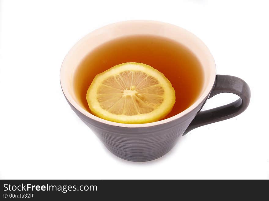 Cup of tea with a lemon