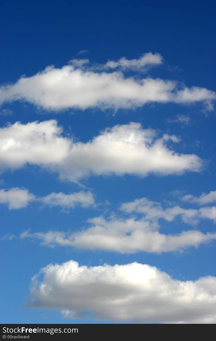 Photo of clouds taken against a blue sky. Photo of clouds taken against a blue sky