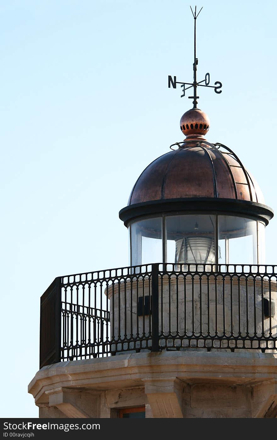 Lighthouse at Puerto de Castellon. Spain. Sunny day.