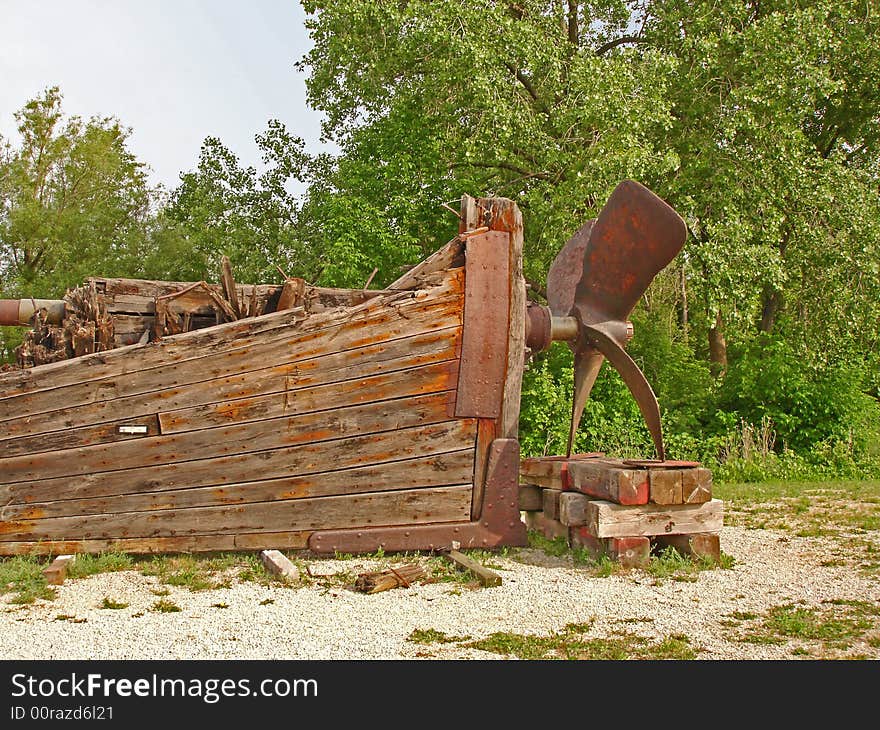 Weathered Wood Boat Beached on Shore