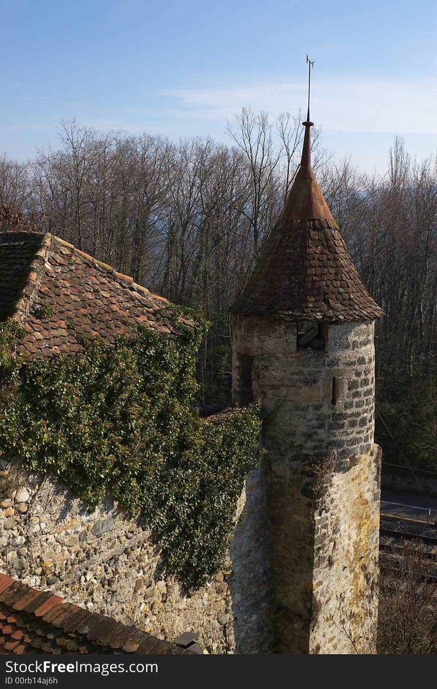 Tower and wall of an old castle in switzerland. Tower and wall of an old castle in switzerland