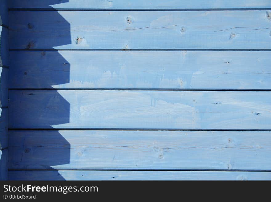 Blue wooden wall pattern with shadows. Blue wooden wall pattern with shadows