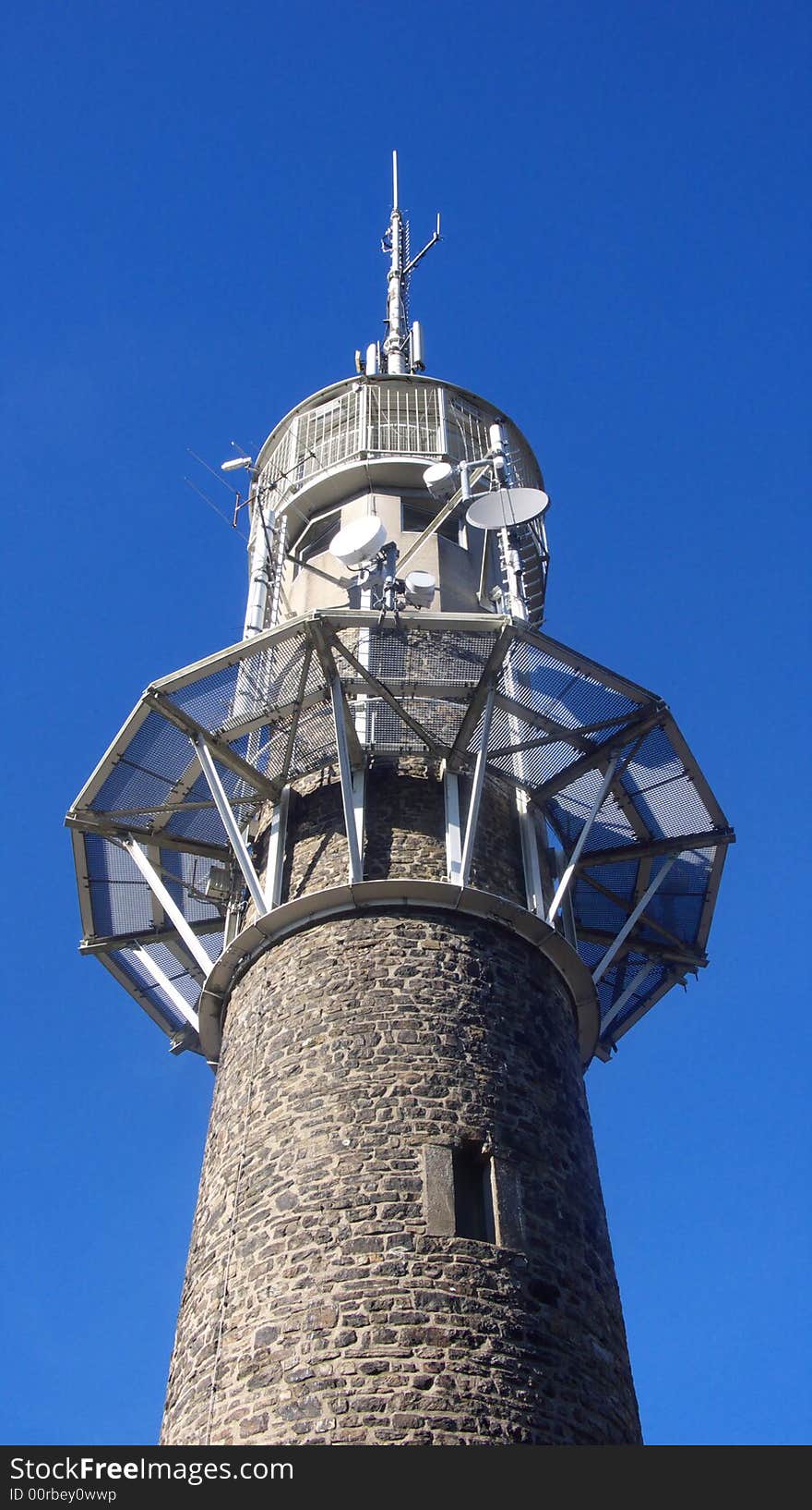 Old tower with new equipment for telecommunication