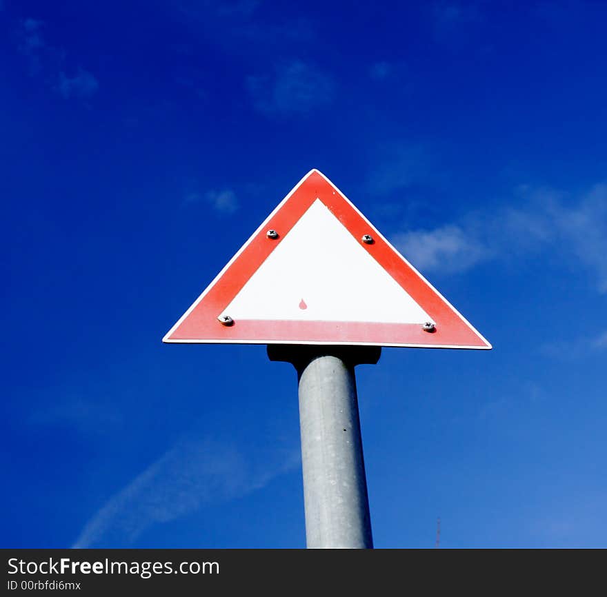 Clear triangle board with blue sky. Clear triangle board with blue sky