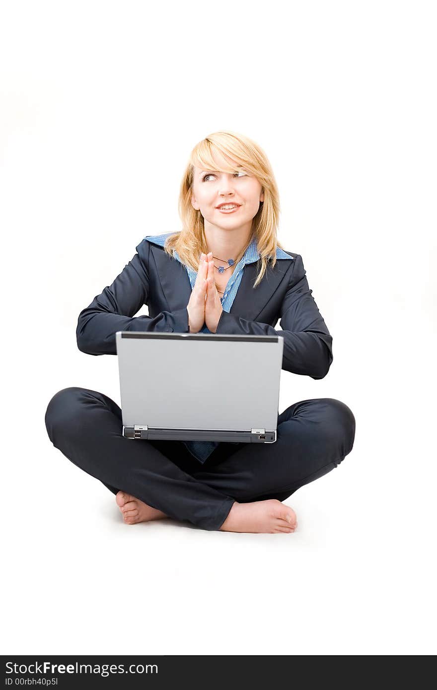 Shoeless woman with laptop