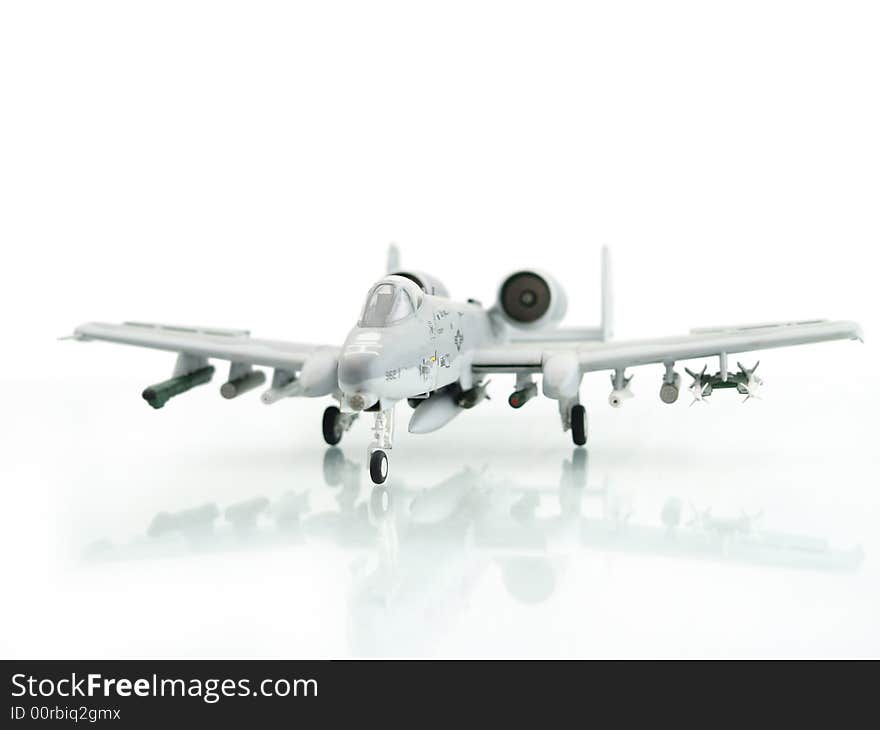 Military miniature toy airplane on white background. Military miniature toy airplane on white background