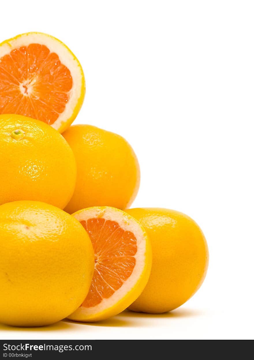 A pile of oranges on white background. A pile of oranges on white background