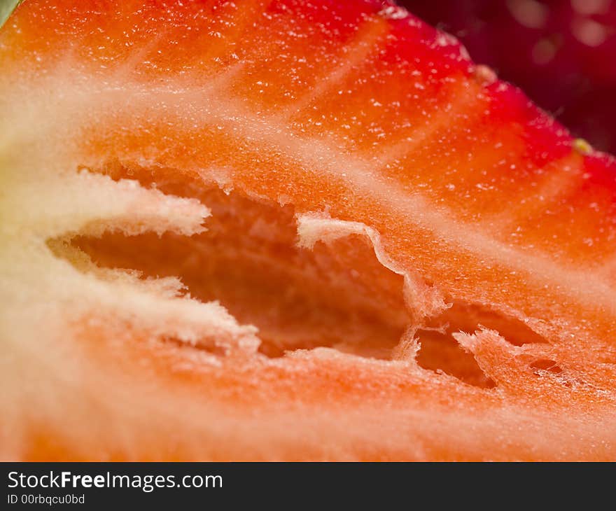 Single strawberry macro with texture