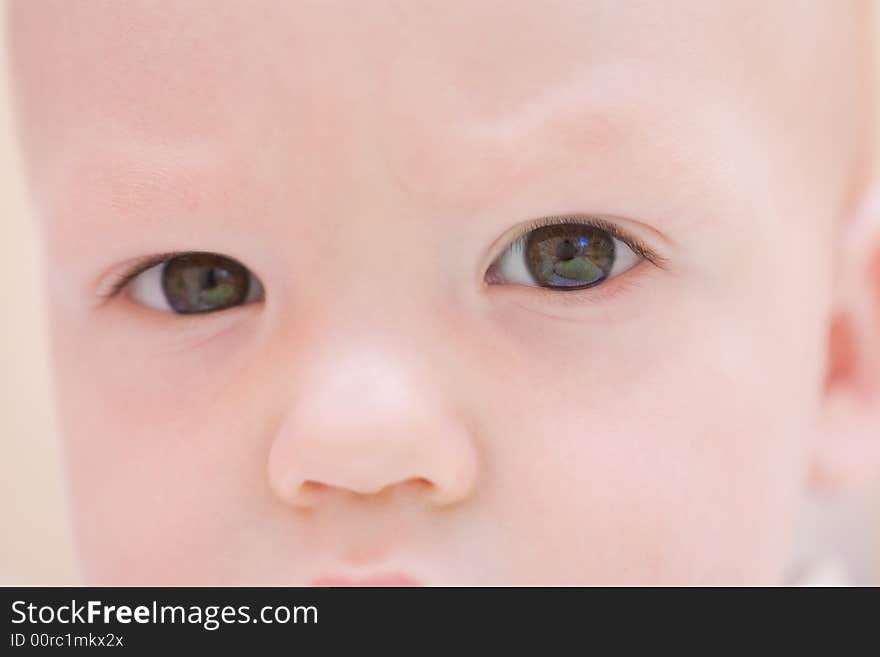 Serious baby face. Eyes close-up