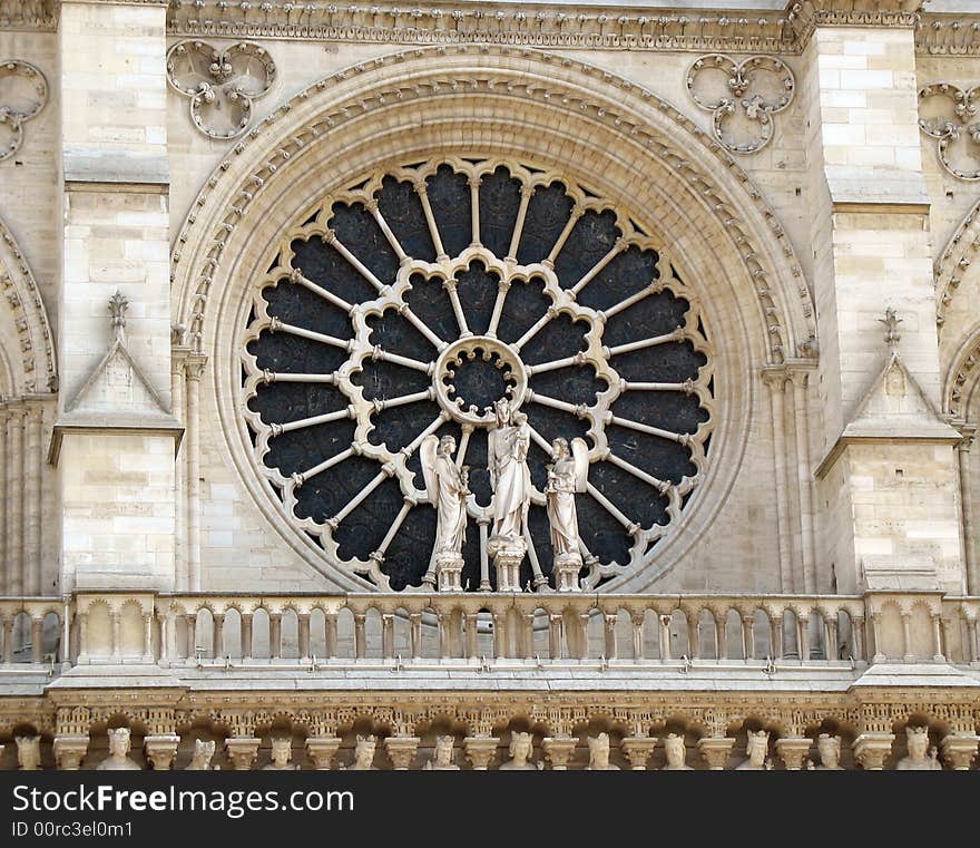 Beautiful church window on the Notre Dame cathedral in Paris.