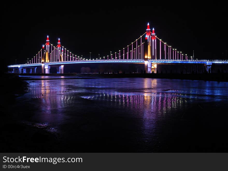 A bridge which is loca in beijing China with light. A bridge which is loca in beijing China with light