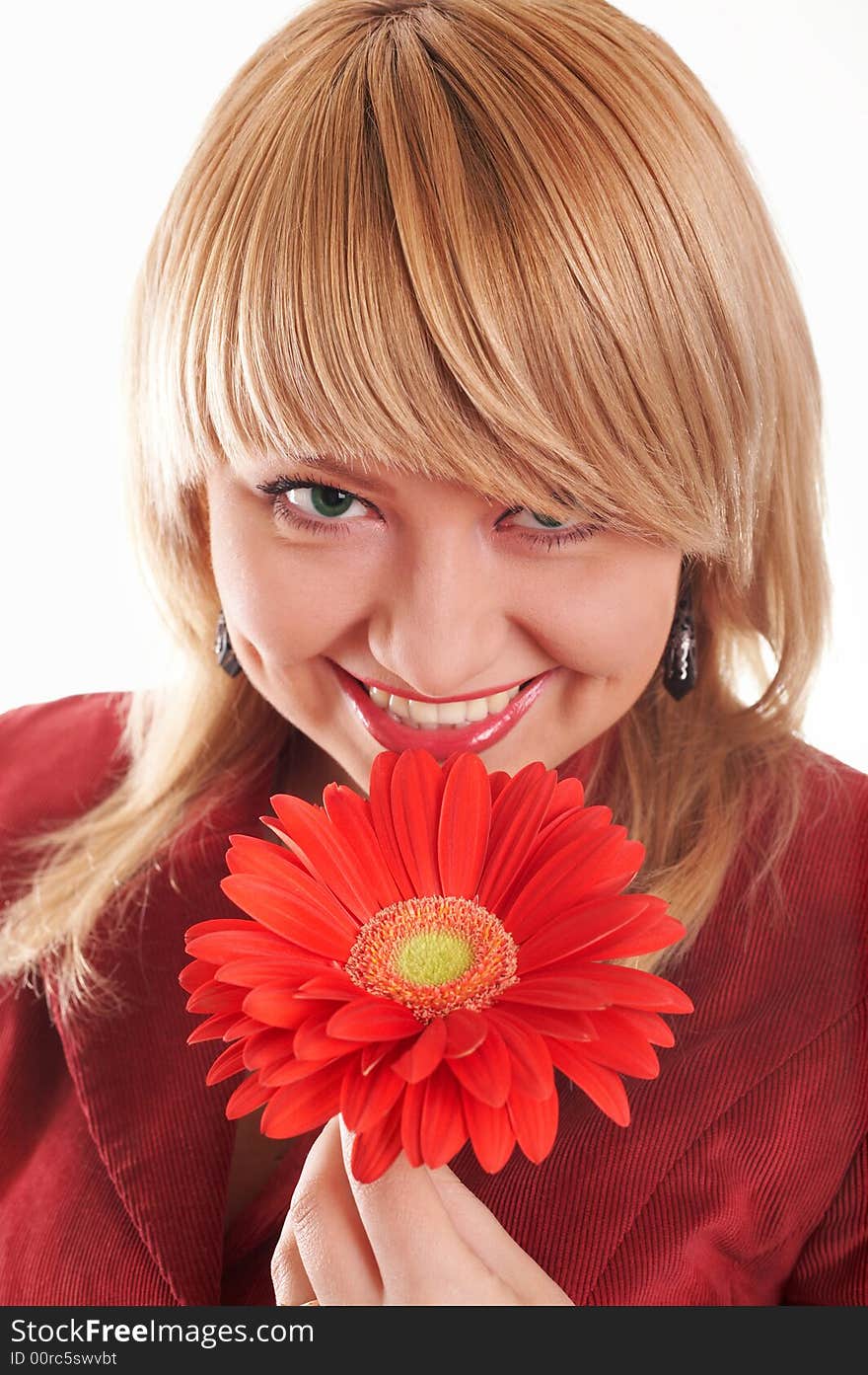 Smiling girl with red flowers