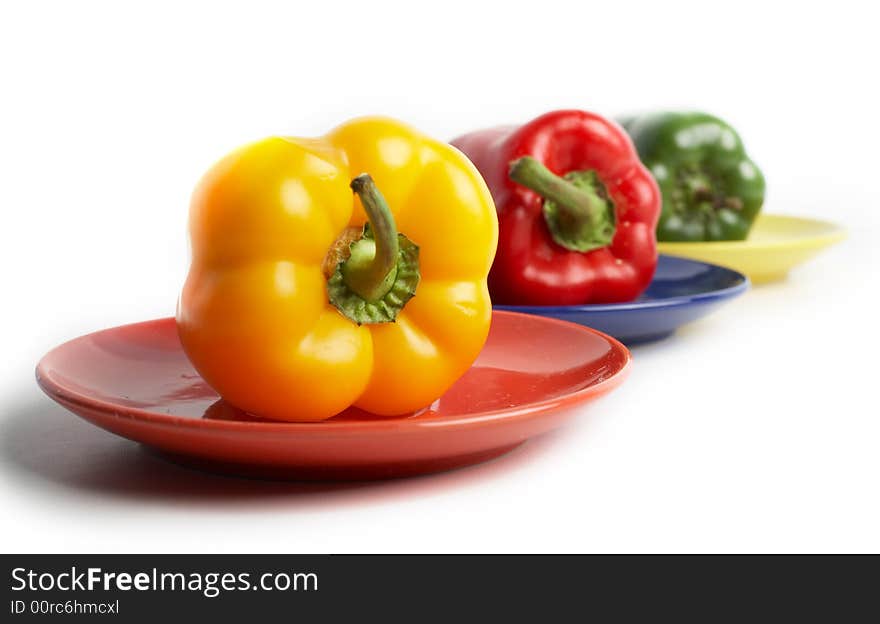 Peppers on saucers