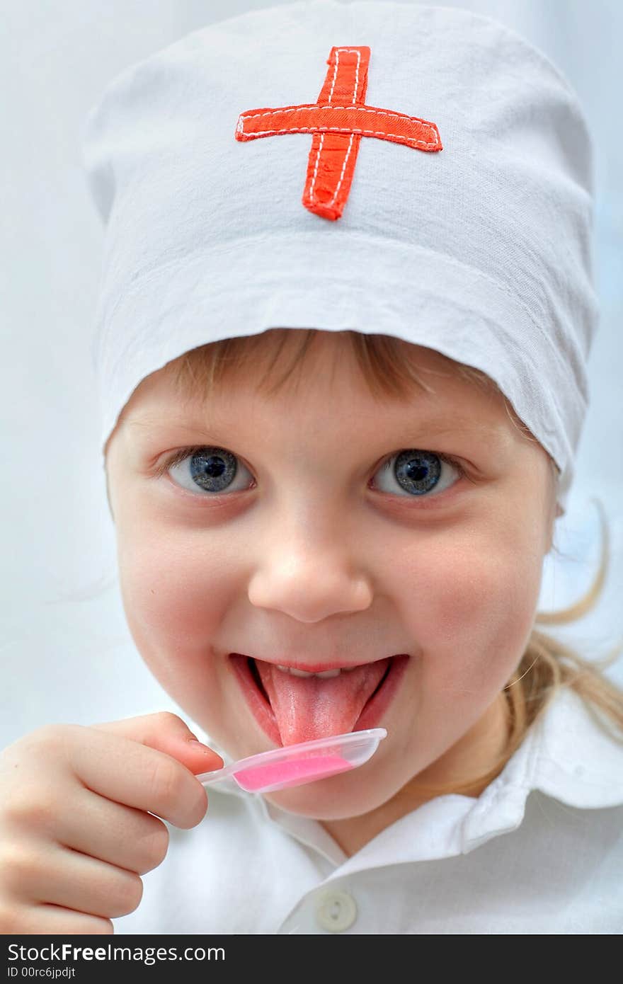 An image of child playing a doctor. An image of child playing a doctor