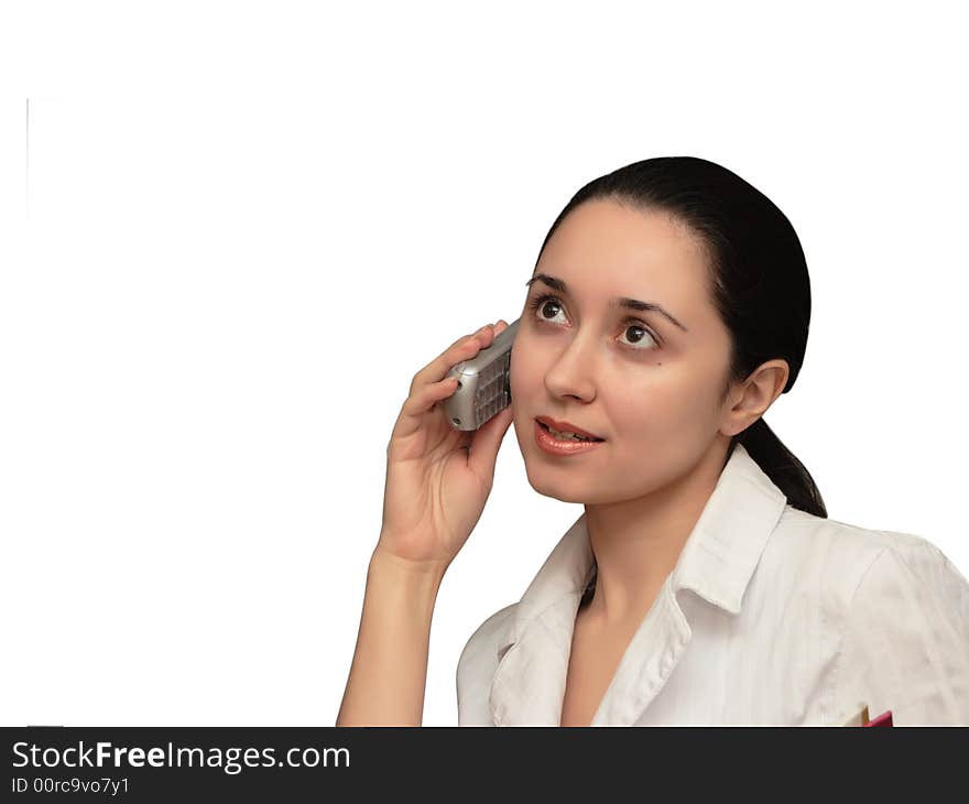 Young woman speaks by phone. Young woman speaks by phone