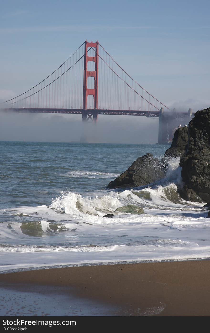 The Golden Gate Bridge in the early morning fog. San Francisco, California, United States. The Golden Gate Bridge in the early morning fog. San Francisco, California, United States.