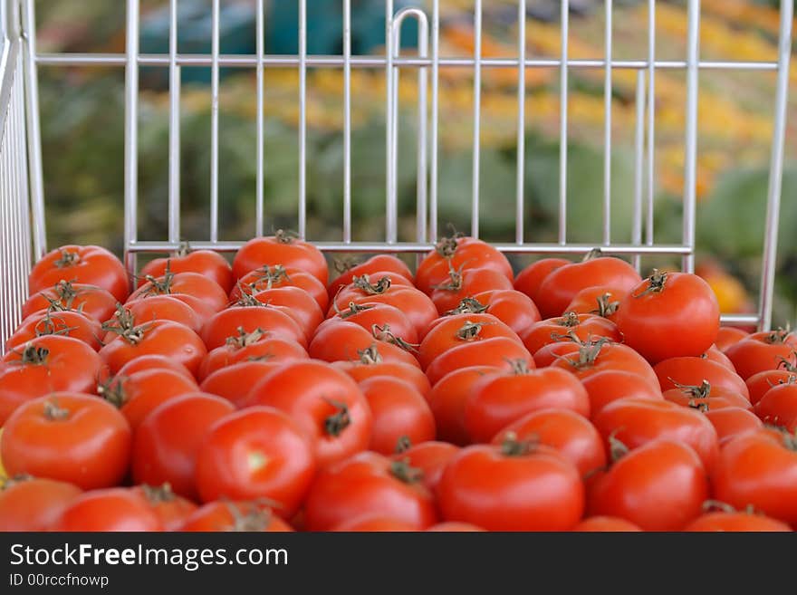 Tomatoes on display in a market