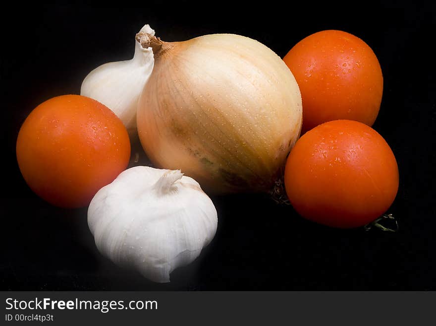 Assorted vegetables on black background