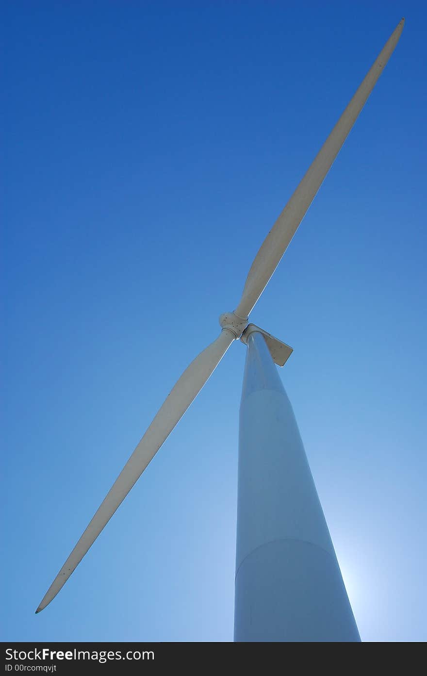 Wind turbine looking up in the sky