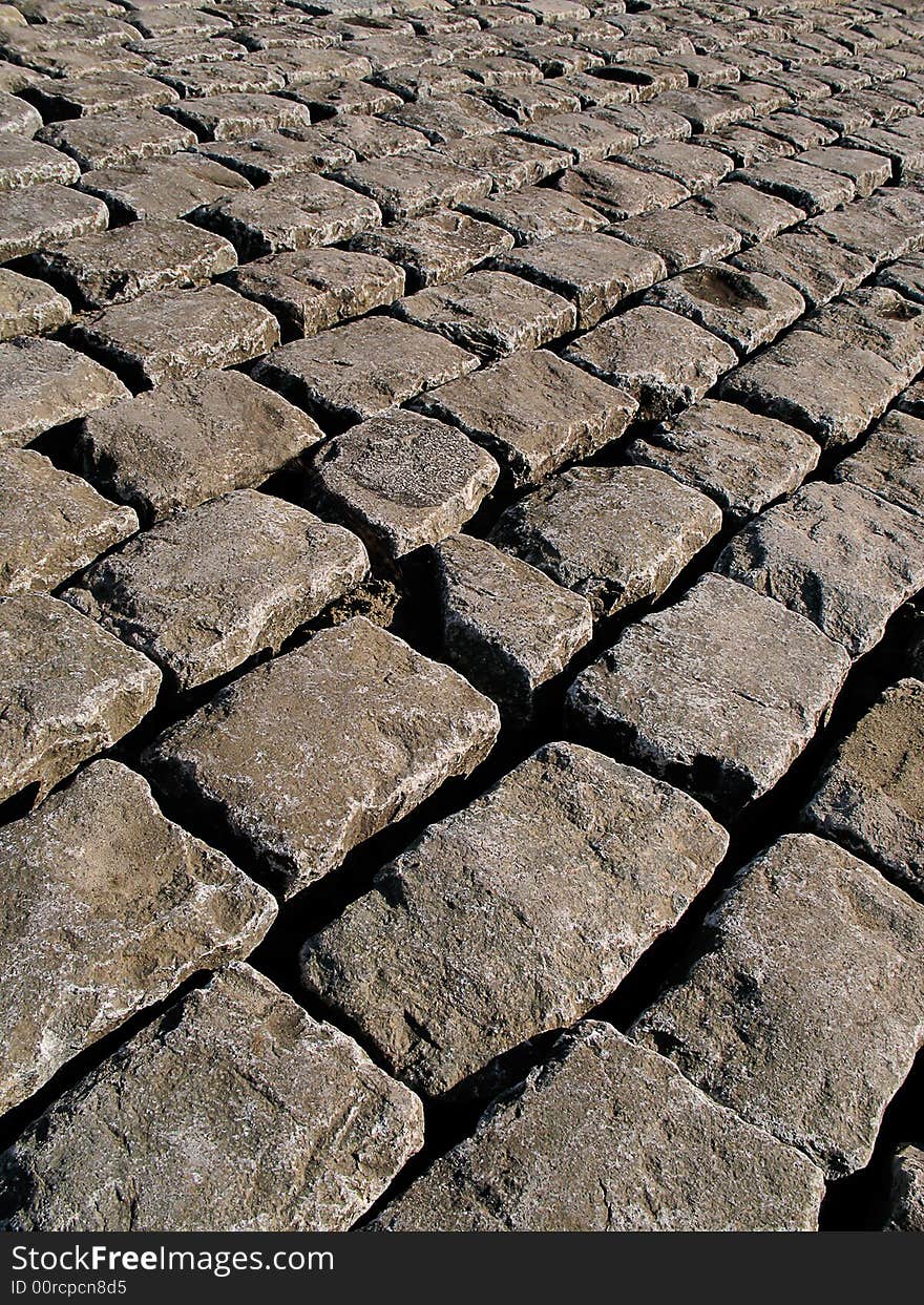 Grey cobble stones on the street