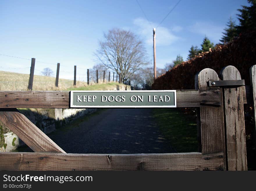 Sign at Kildrummy castle telling dog owners to keep them on a lead. Sign at Kildrummy castle telling dog owners to keep them on a lead