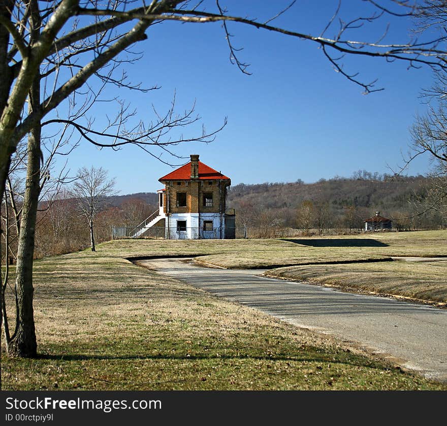 An old abandoned building and blue sky