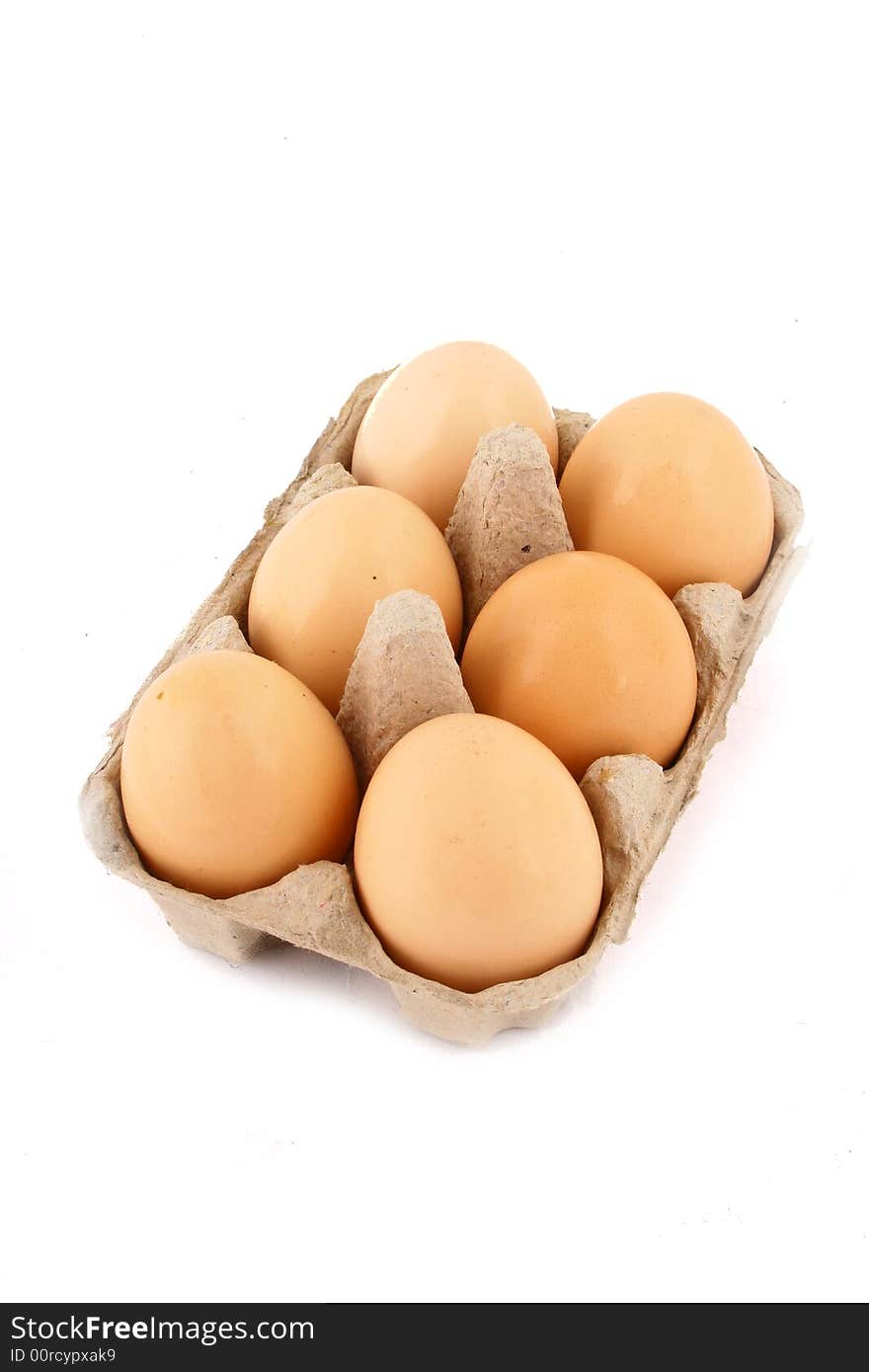 Brown eggs against a bright white background