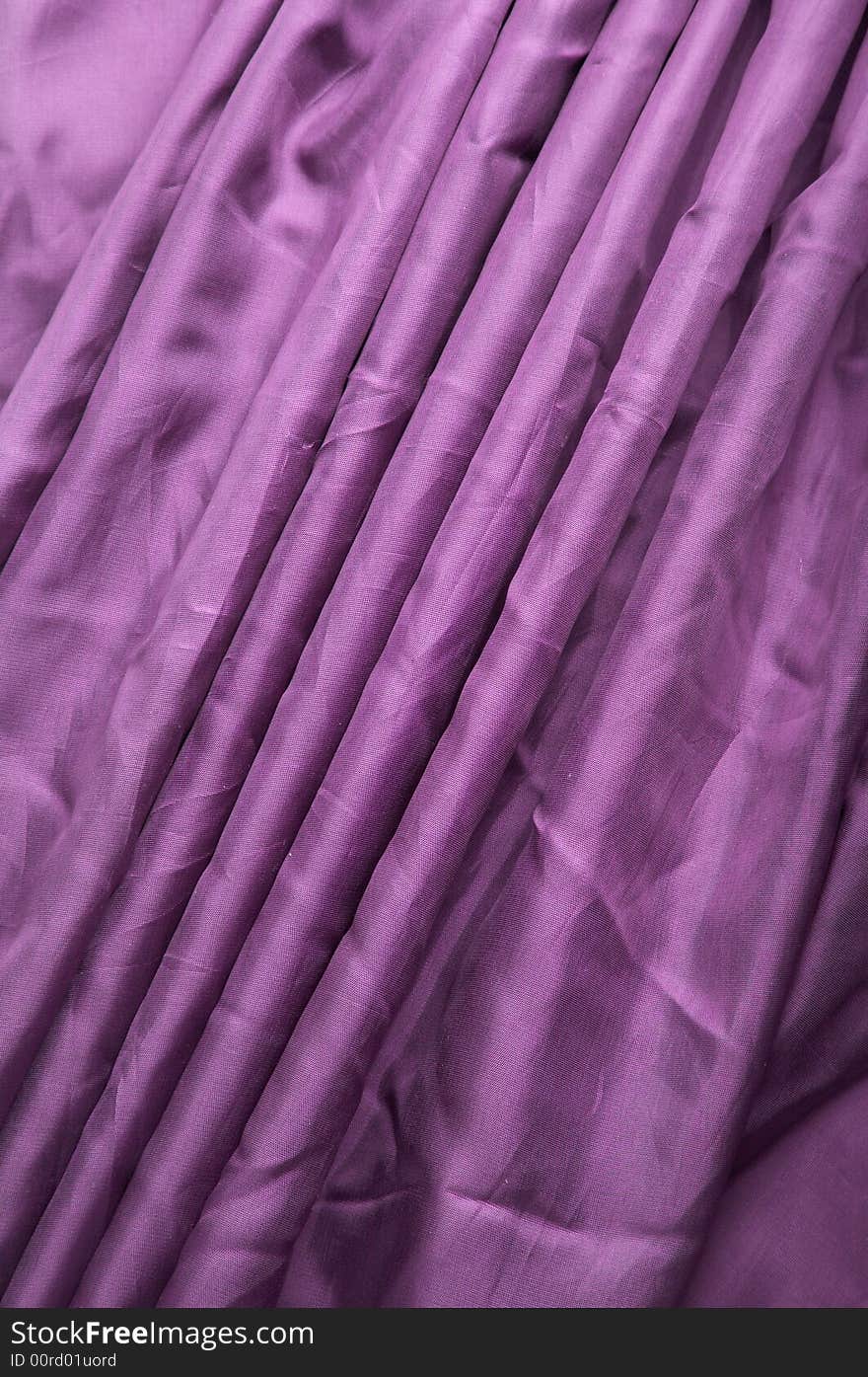 Violet abstract background silk fabric with waves. Violet abstract background silk fabric with waves