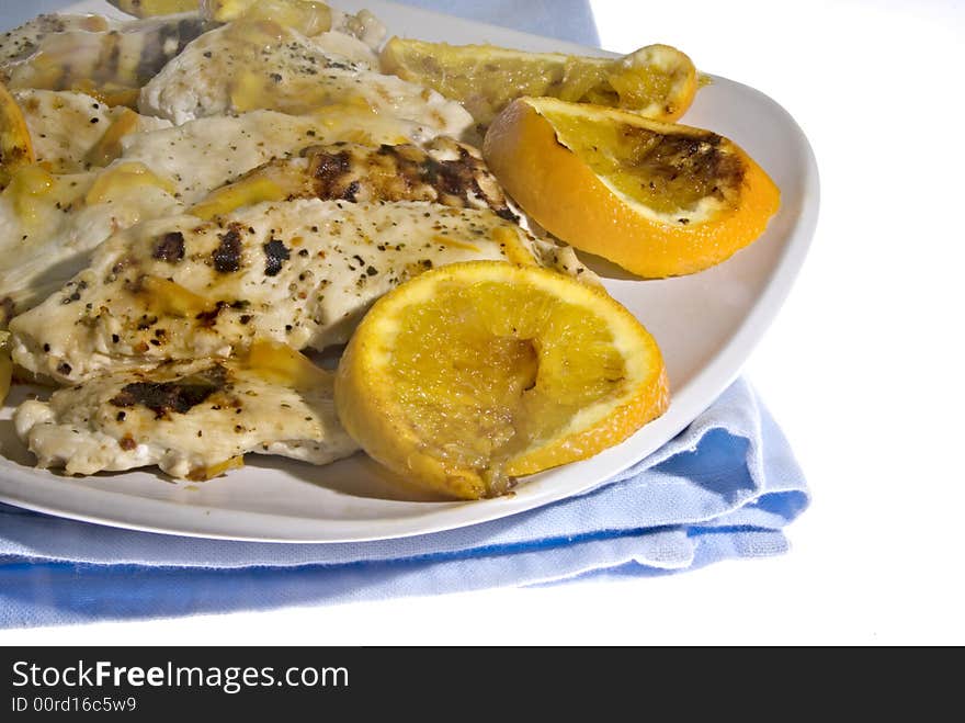 Grilled chicken with ornages and orange marmalade sauce. Grilled chicken with ornages and orange marmalade sauce.