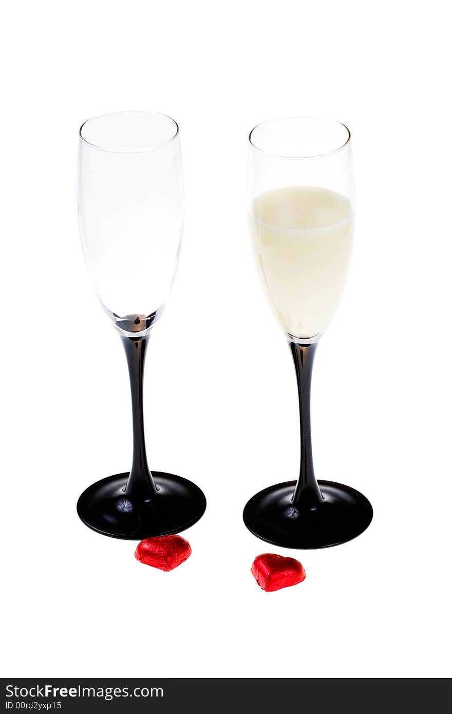 Glasses With Alcohol And Red Hearts (isolated)