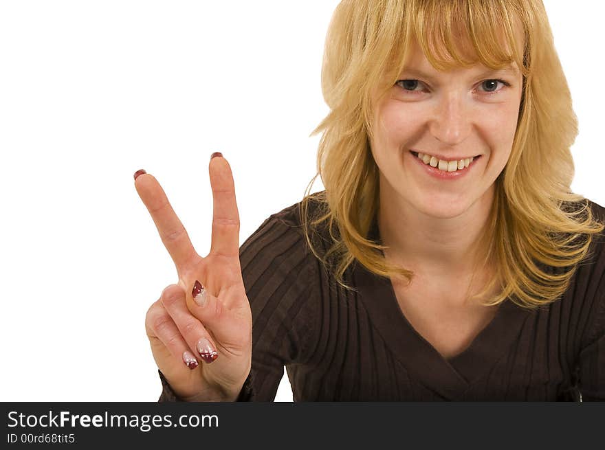 Blond woman showing a peace sign with fingers. Blond woman showing a peace sign with fingers