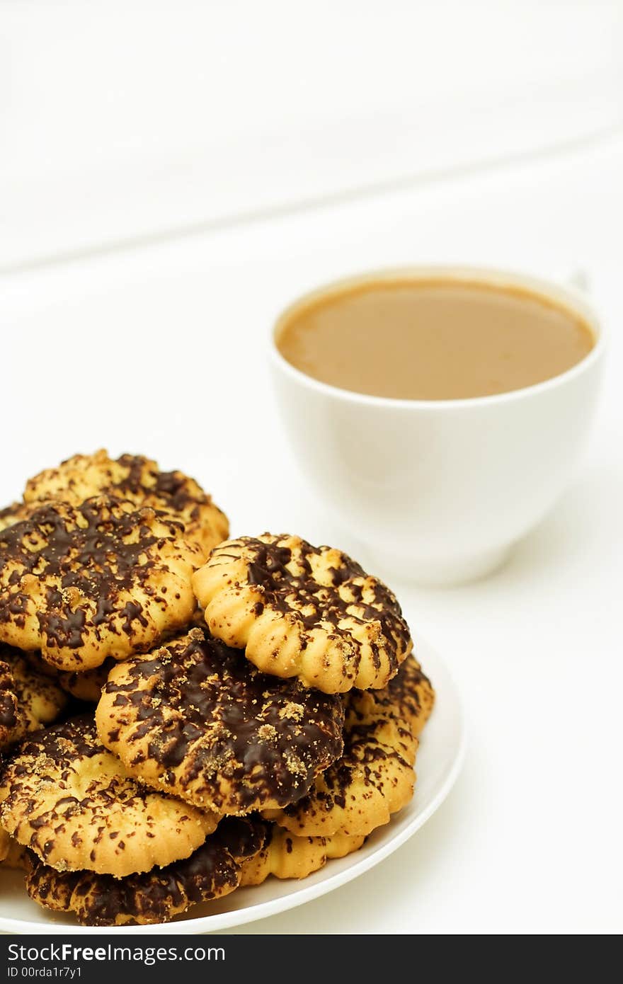 Cookies and coffee. On white.