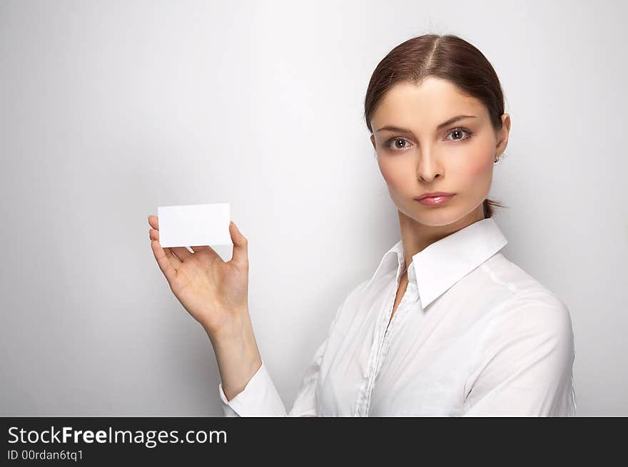 Young woman on the white background