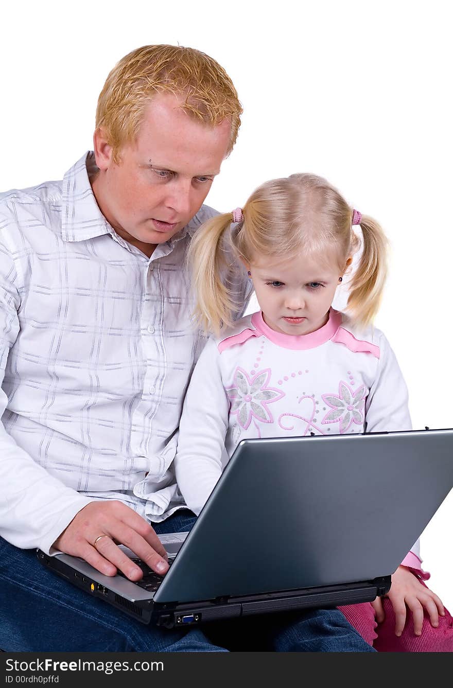 Father and daughter using laptop