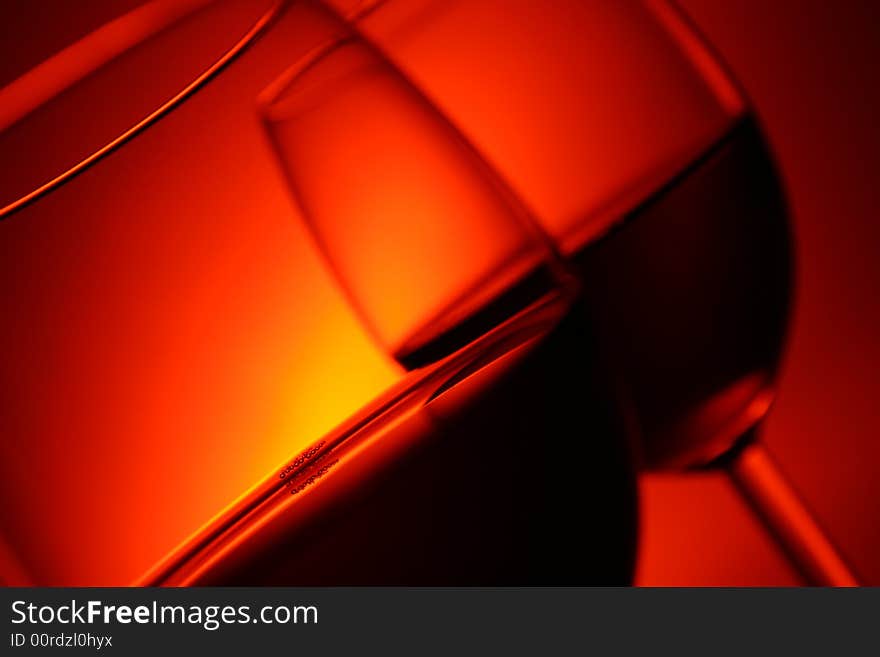 Two glasses on red background