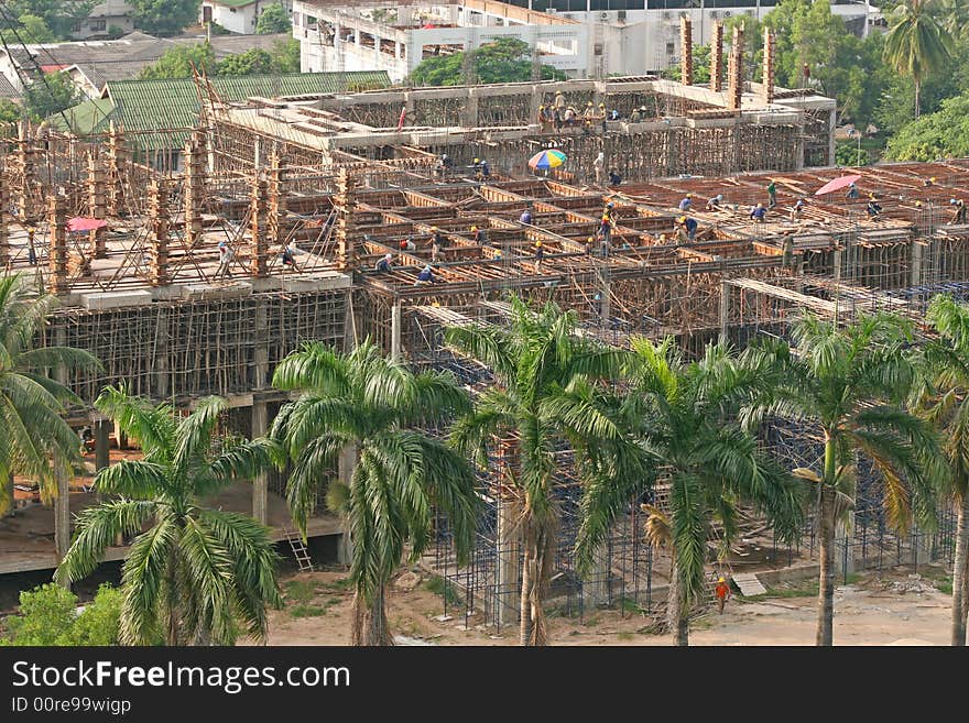 A new office construction set in the palm trees in downtown bangkok. A new office construction set in the palm trees in downtown bangkok