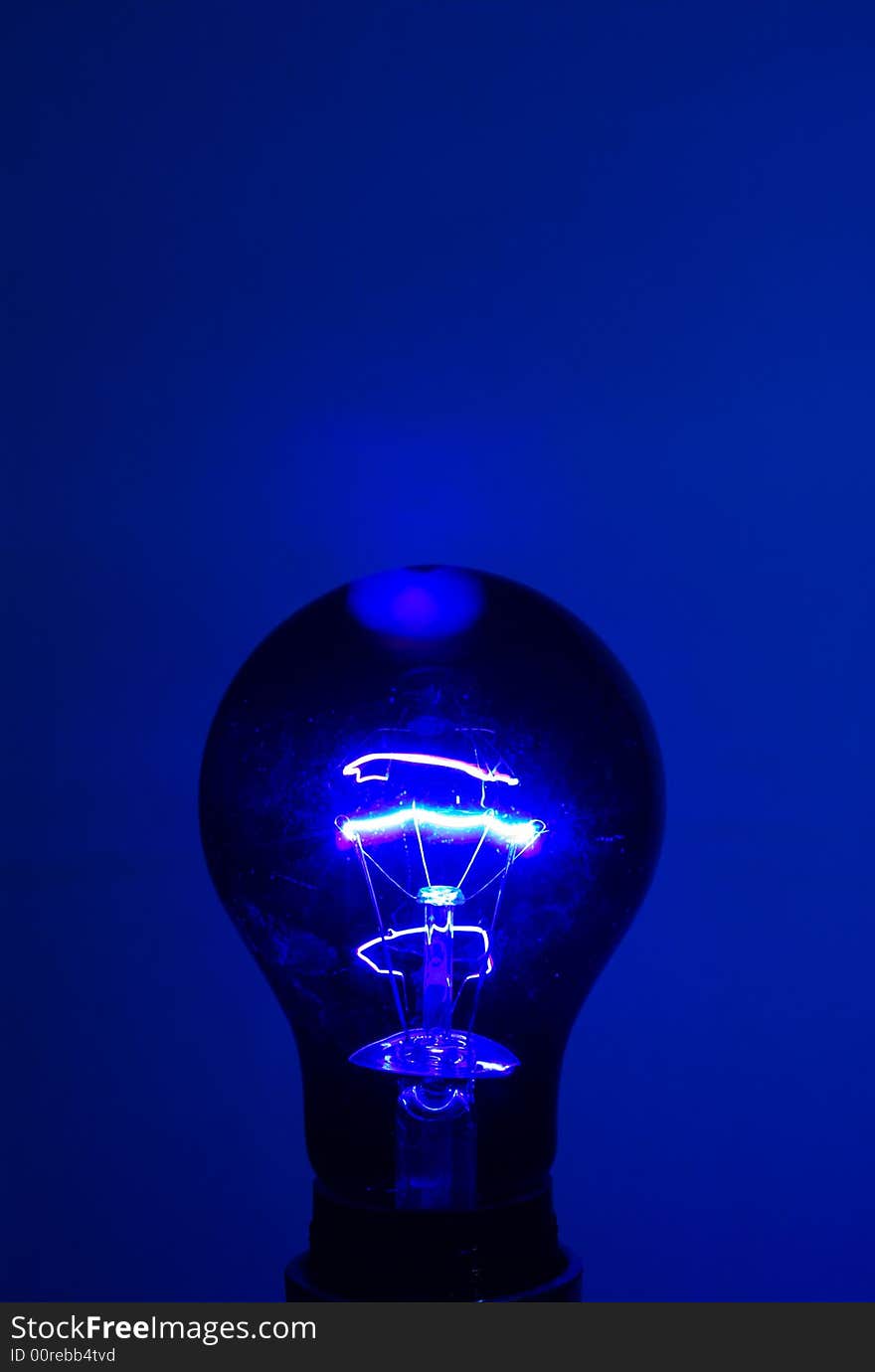 A Black light on blue background. A Black light on blue background.