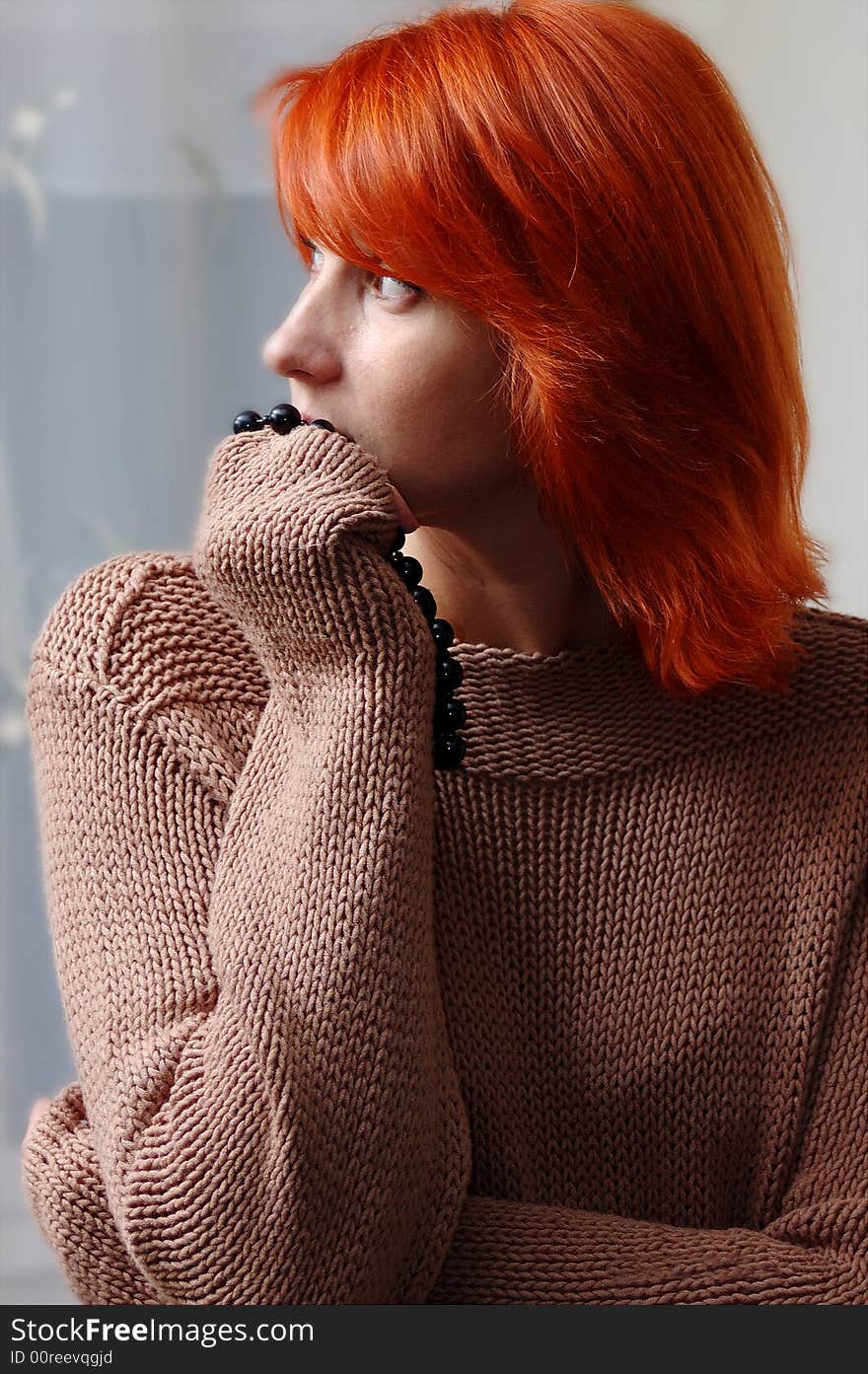 Closeup portrait of a fresh-faced natural woman, young and pretty, with red hair and freckles . Closeup portrait of a fresh-faced natural woman, young and pretty, with red hair and freckles .