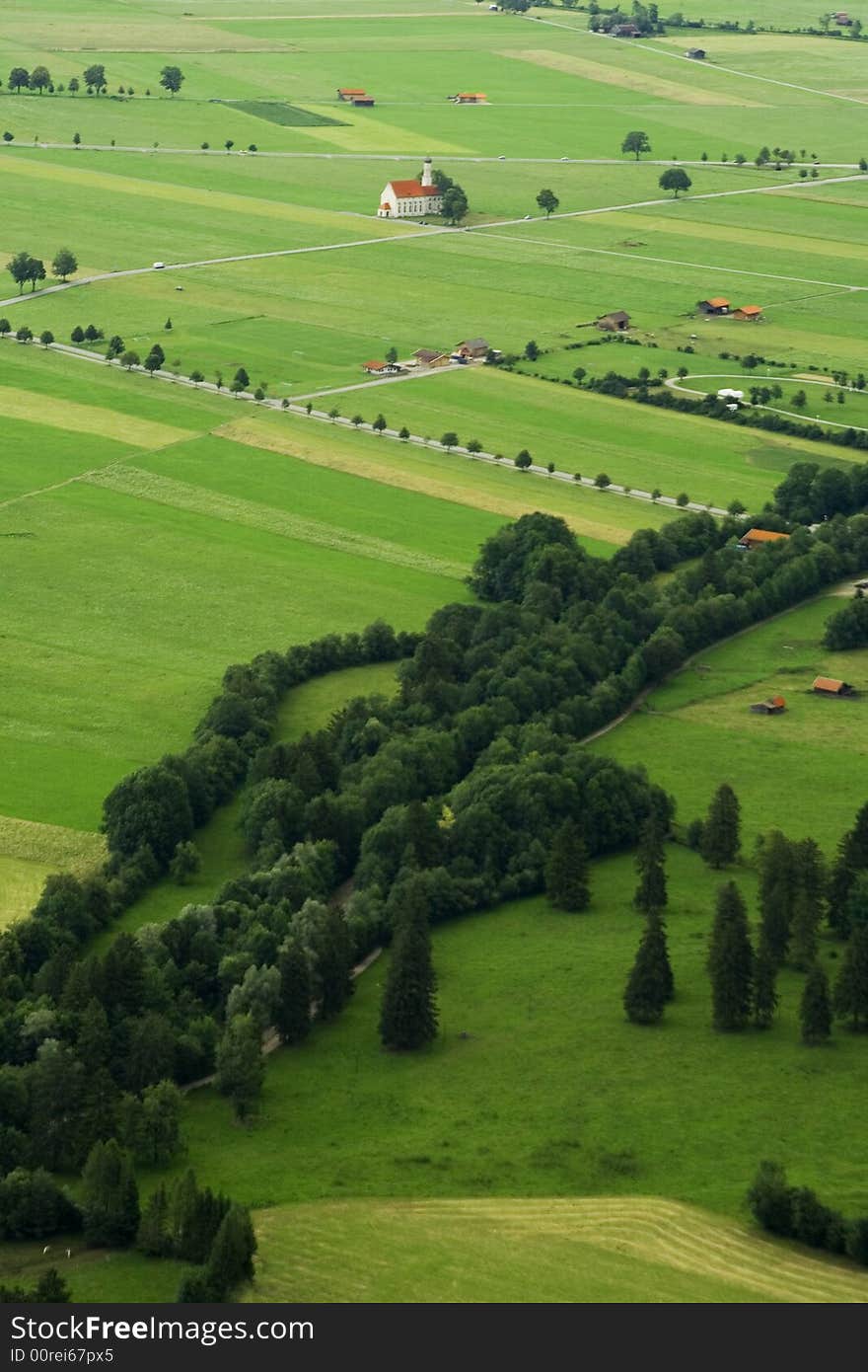 The green fields