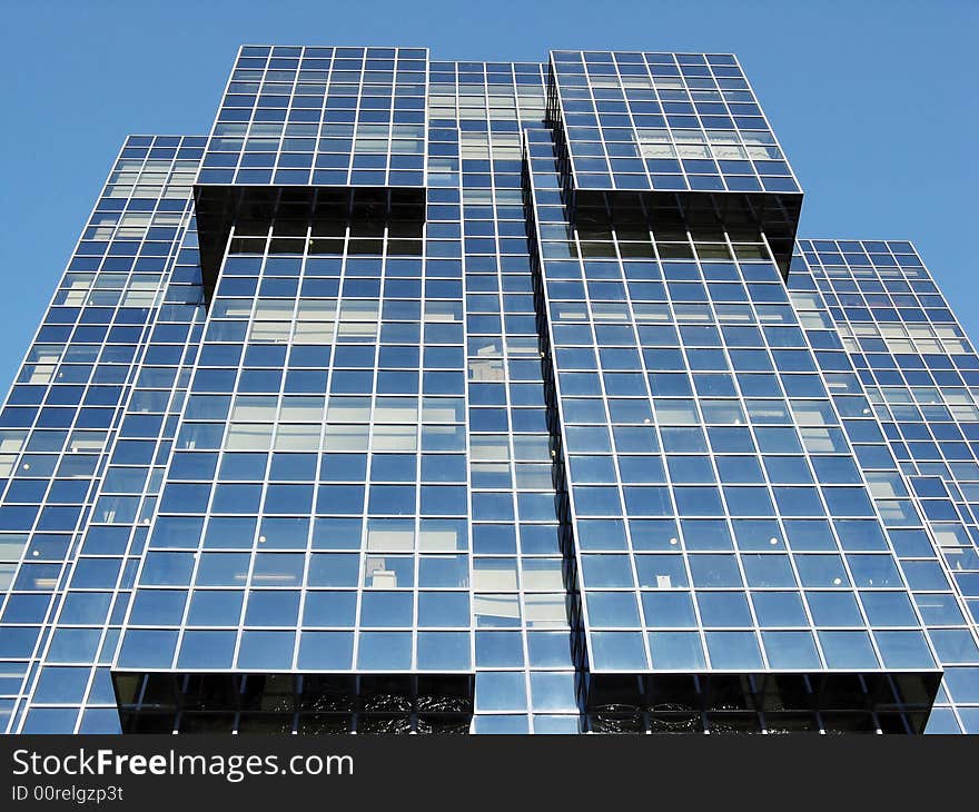 Looking up at a modern office block in London. Looking up at a modern office block in London