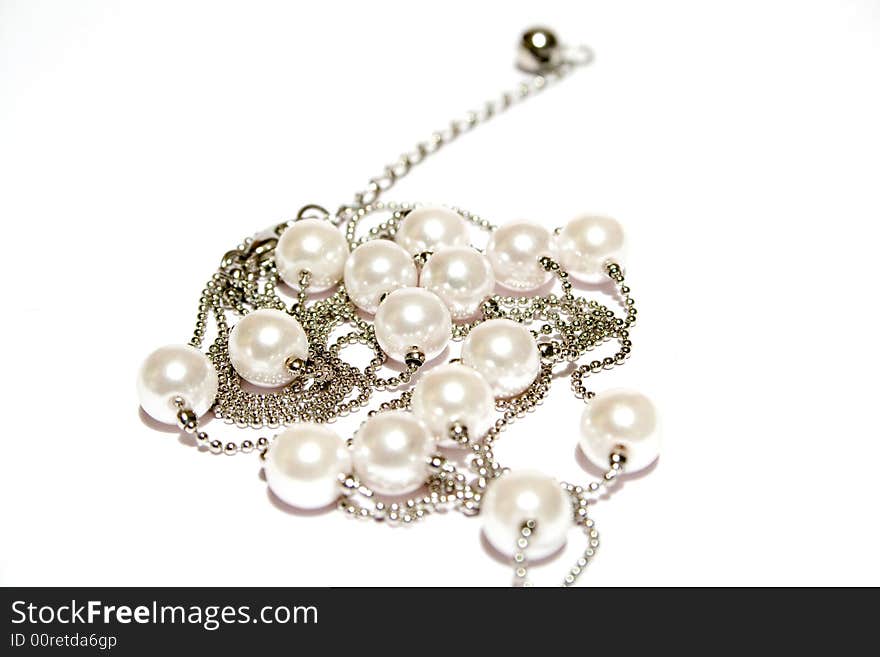 Pearl necklace on white isolated background