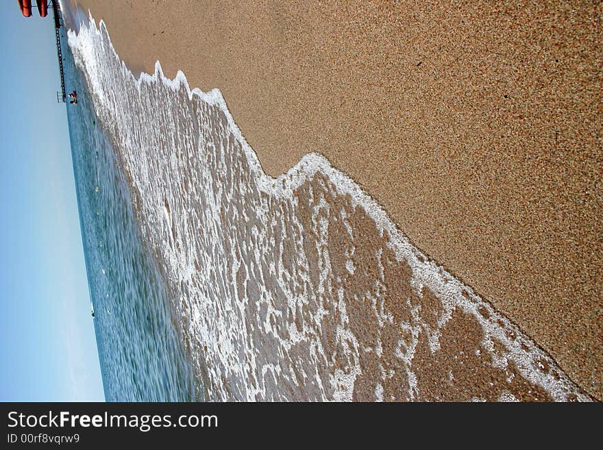 Sandy coast of lake.