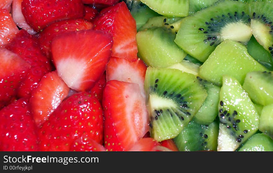 A fresh fruit salad, with kiwi and strawberry. A fresh fruit salad, with kiwi and strawberry